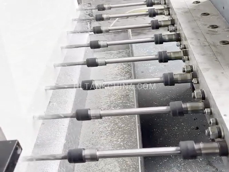 GRP water tank panel drilling machine working